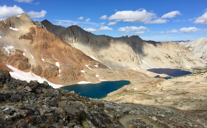 The view to the south from Pinchot Pass.  Two basic mouintain colors.  Two lakes at slightly different elevations and colors.  One awestruck hiker.