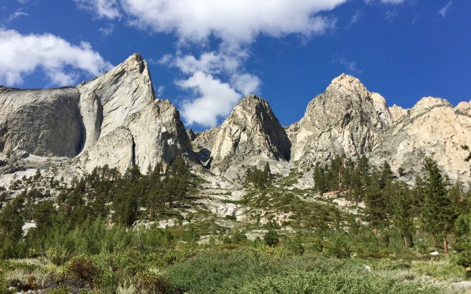 Rock mountains look down on the Woods Creek Trail