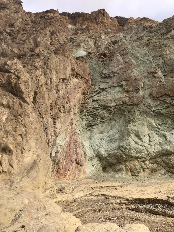 Even in a place like this, purple and green rocks seem strange.