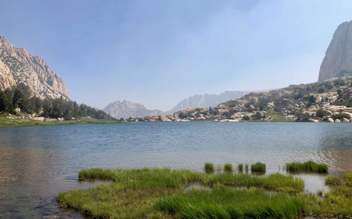 Additional mountains rise in the distance past Snow Lake at Rock Island Pass