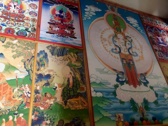 Bhuddist paintings adorn the walls of this stupa