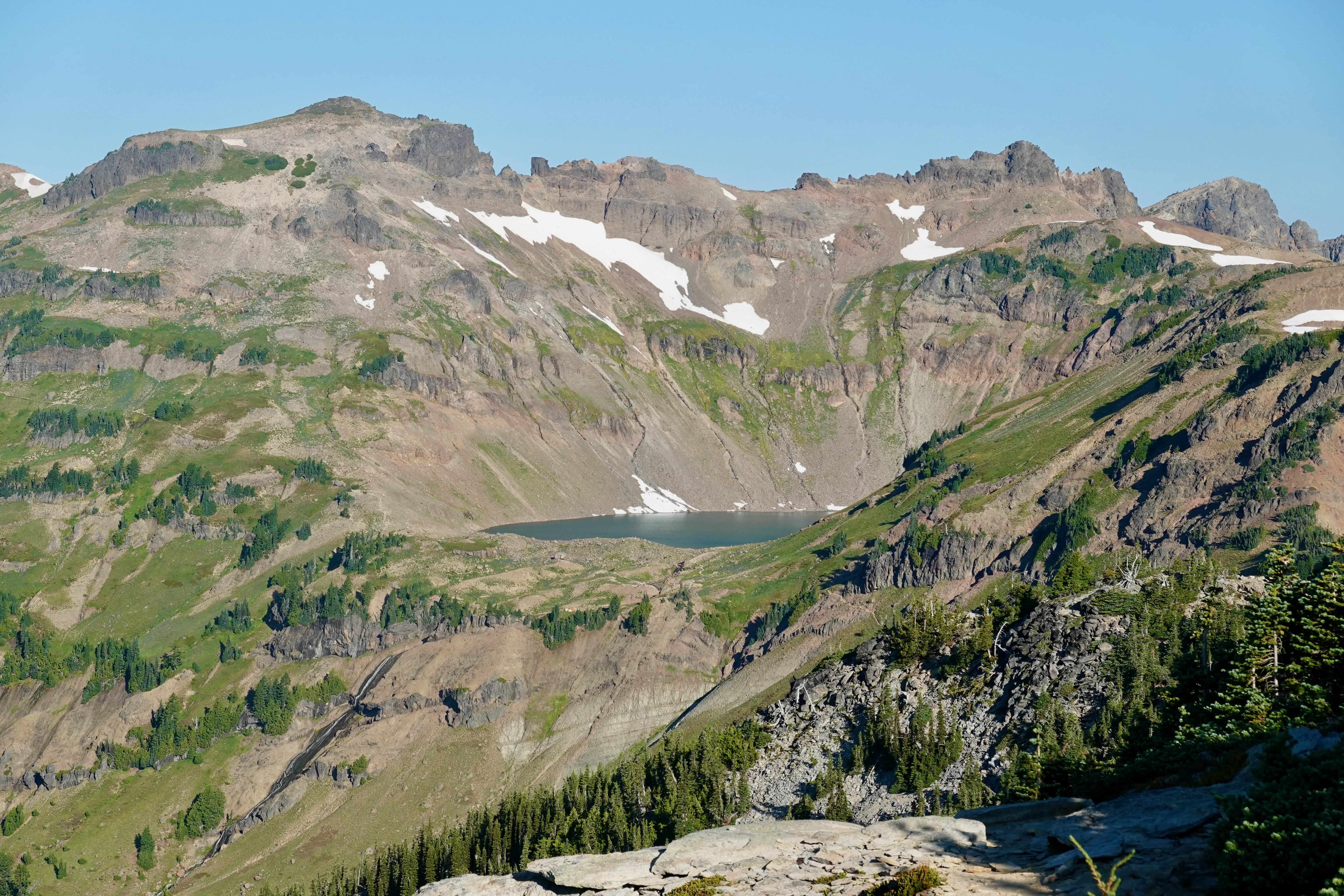 I liked this little semi-hidden lake trapped high in the mountains